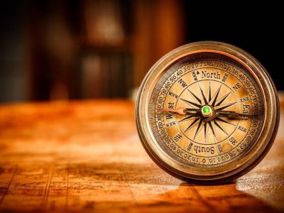 vintage-still-life-vintage-compass-lies-ancient-world-map-1565_564276-11207
